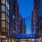 The exterior of the Illume Apartments in Navy Yard Washington DC, featuring a view of the modern facade and the sky at dusk.