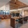 Resident lounge at our apartments for rent in Washington DC, featuring wood grain floor paneling and counter seating.