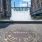 Photograph of a manhole cover reading 