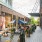 Outdoor pedestrian street near our Washington DC apartments including outdoor dining, eateries, and people dining.